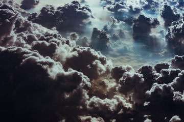 cloud and sky view from the window of an airplane