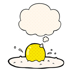 cartoon fried egg and thought bubble in comic book style