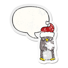 cartoon christmas penguin and speech bubble distressed sticker