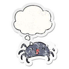 cartoon spider and thought bubble as a distressed worn sticker