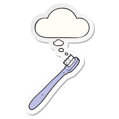 cartoon toothbrush and thought bubble as a printed sticker