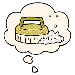 cartoon scrubbing brush and thought bubble in comic book style