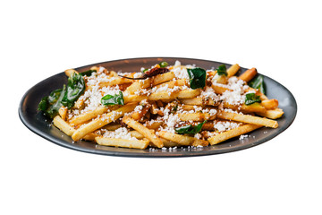 Isolated close-up French fries with fried basil, Thai chili and feta cheese with fork. Thai fusion food.