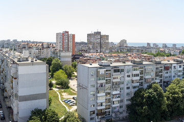 Obraz premium Aerial view of urban area. Residential buildings, street, cars in Eastern Europe.