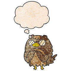cartoon wise old owl and thought bubble in grunge texture pattern style