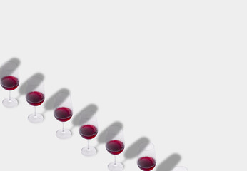 Minimal composition background of red wine glasses
