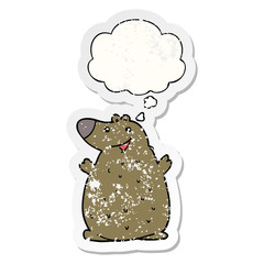 cartoon happy bear and thought bubble as a distressed worn sticker