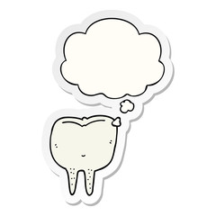 cartoon tooth and thought bubble as a printed sticker