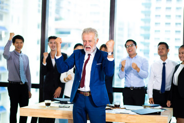 Working Successful Concept. business team celebrating success together on workplace.clap their hands to congratulate