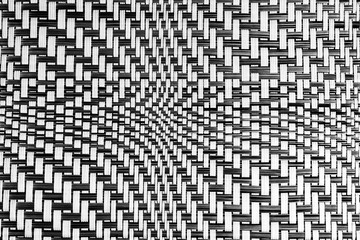 Wavy dark gray texture. Reworked close-up photo of wall surface. Grunge abstract black and white background