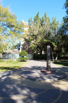Part of the ruins of the Genoese castle Caffa in the city of Feodosia in the Crimea in the autumn under the open sky. Architecture, history, travel and tourism concept.