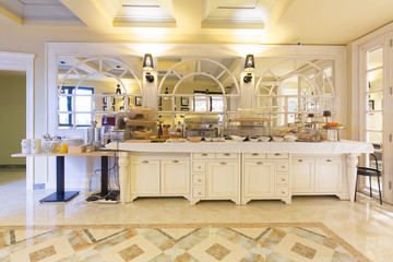 Interior of a  hotel restaurant with buffet table