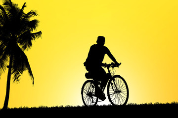 Cycling Silhouette on blurry sunset