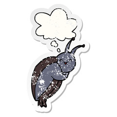 cute cartoon beetle and thought bubble as a distressed worn sticker