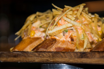 tapas, pintxos and canapes at the bar of san sebastian - donostia, spain