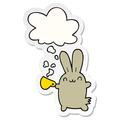 cute cartoon rabbit drinking coffee and thought bubble as a printed sticker