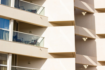 Fototapeta premium modern common living building facade exterior architecture background with white wall balcony and window 