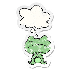 cartoon frog and thought bubble as a distressed worn sticker