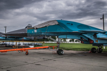 Russian military fighter bomber planes Su-34 at closed airfield