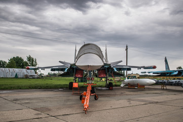 Russian military fighter bomber planes Su-34 at closed airfield