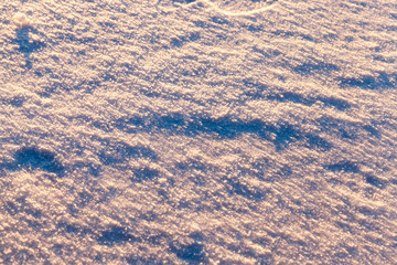 Snow drifts in winter - snow photographed in the winter season, which appeared after a snowfall. close-up,