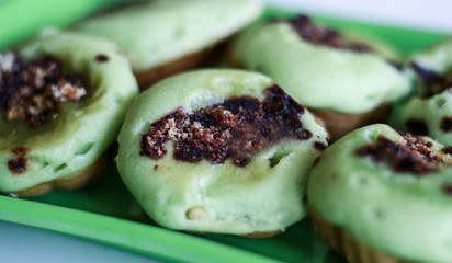 Pinch Cake or kue cubit on white background. Traditional Indonesian cakes normally sold by street...