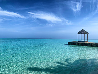 Sunbed on the platform on the sea, Maldives