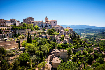 View on Gordes, a small typical town in Provence, France. Beautiful village, with view on roof and landscape