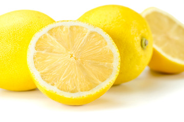 Juicy lemons on a completely white background. Fruits and vitamins.