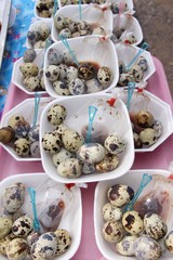 Quail eggs with sauce in street food