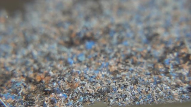 Destroyed plastic particles fall to reservoir. Plastic as products floats in water and gradually disintegrates into fragments. Concept of pollution of world ocean by plastic
