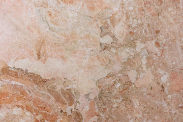 marble tiles with stains of different colors and sizes with cracks from old age
