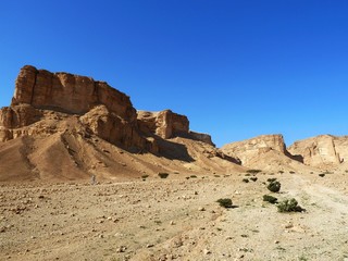 Fototapeta na wymiar Rock escarpments on the edge of the Triassic and Jurassic sedimentary outcrops west of Riyadh