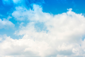 Beautiful natural blue sky background with clouds in sunny day.