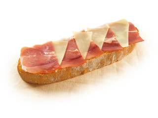 Tosta jamón y queso. bread with jam and cheeses 