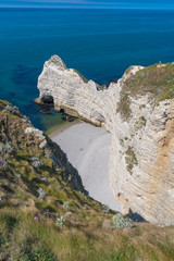 Fototapeta na wymiar Etretat, France - 05 31 2019: Panoramic view of the cliffs of Etretat