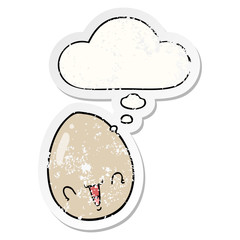 cartoon egg and thought bubble as a distressed worn sticker