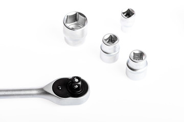 Top notch service. socket wrench isolated on white background. various wrench heads and tips. Socket wrench toolbox. Toolbox, tools kit detail close up.