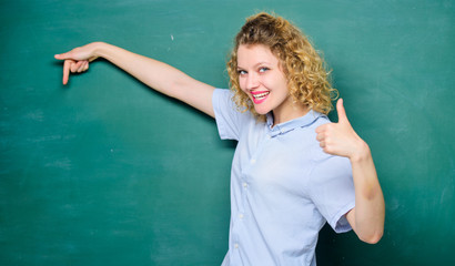 here it is. education. Students life. woman teacher at school lesson. knowledge day. empty blackboard information. back to school. woman likes studying. happy student at blackboard. success gesture