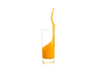 splash of orange juice in glass isolated on white background.