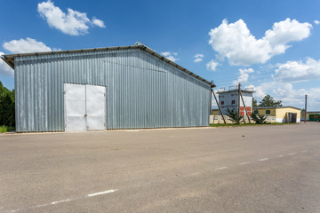 Fototapeta na wymiar Hangar for fruits and vegetables in storage stock. production warehouse. Plant Industry