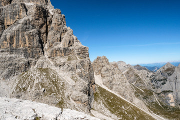 Fototapeta na wymiar Panoramic view of famous Dolomites mountain peaks, Brenta. Trentino, Italy