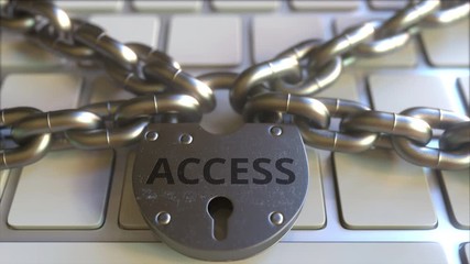 Padlock with ACCESS text on the computer keyboard. Blocking or restriction related 3D animation