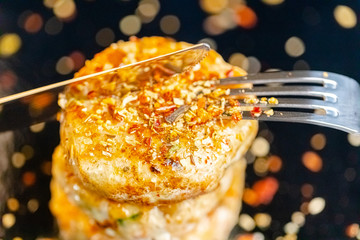 homemade meatballs, cutlets fried from red and white fish meat, in a vintage rustic bowl plate,...