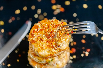 homemade meatballs, cutlets fried from red and white fish meat, in a vintage rustic bowl plate,...