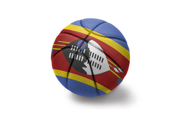 Obraz premium basketball ball with the national flag of swaziland on the white background