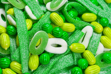 Assorted green gummy candies background. Top view. Jelly  sweets.