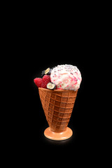 Ice cream with blueberries, blackberries and raspberries on a black background.  Copy space.