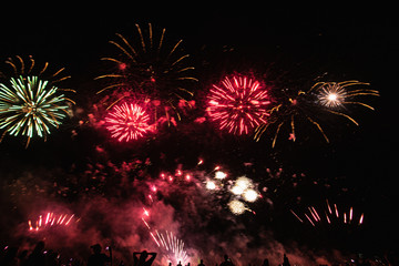 Real Fireworks footage 4k video on Deep Black Background Sky on Futuristic Fireworks festival show...