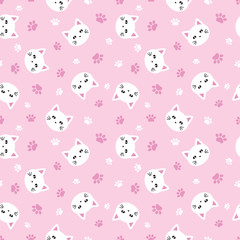 Seamless pattern cute cat faces and paws on pink background